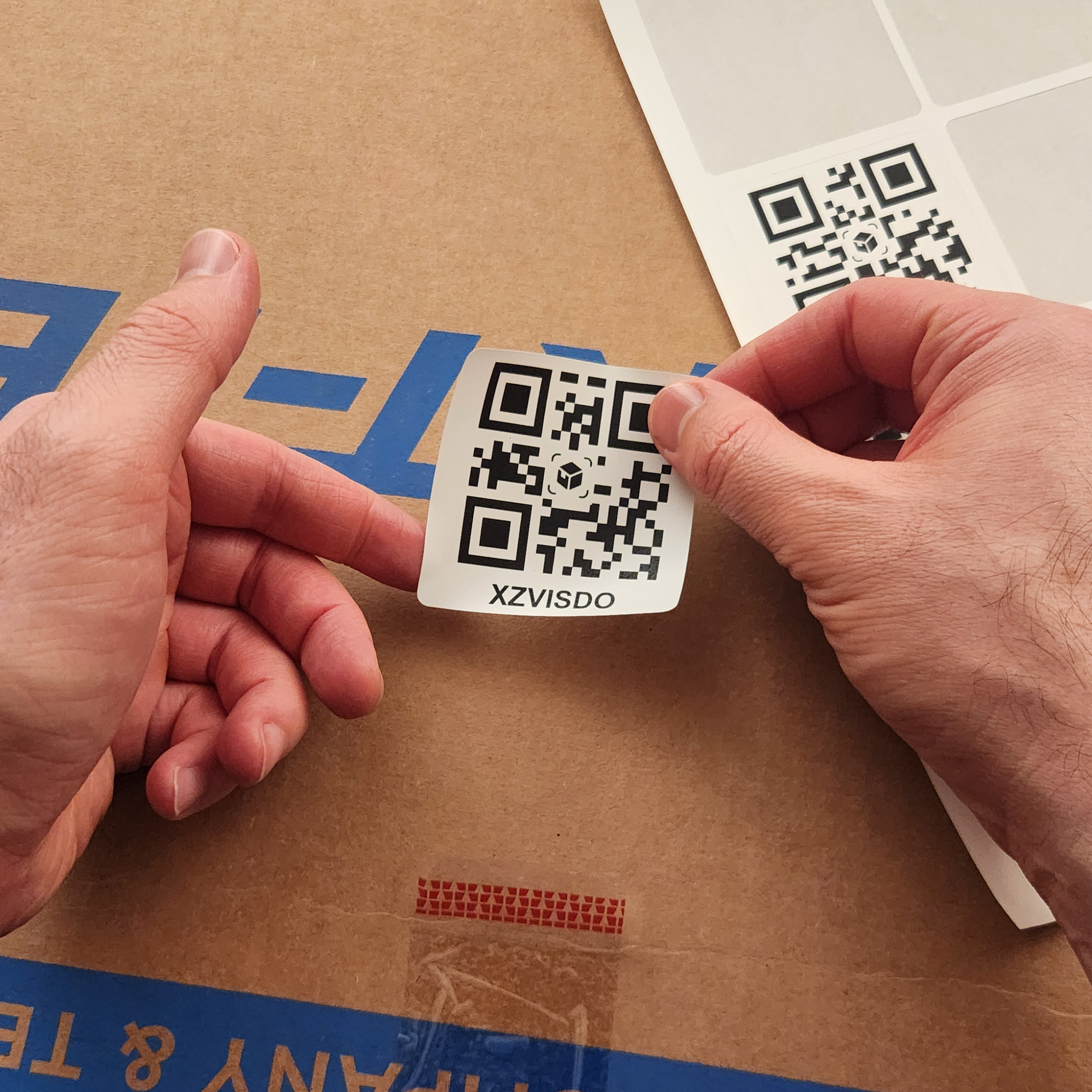 Waterproof QR code sticker attached to storage box